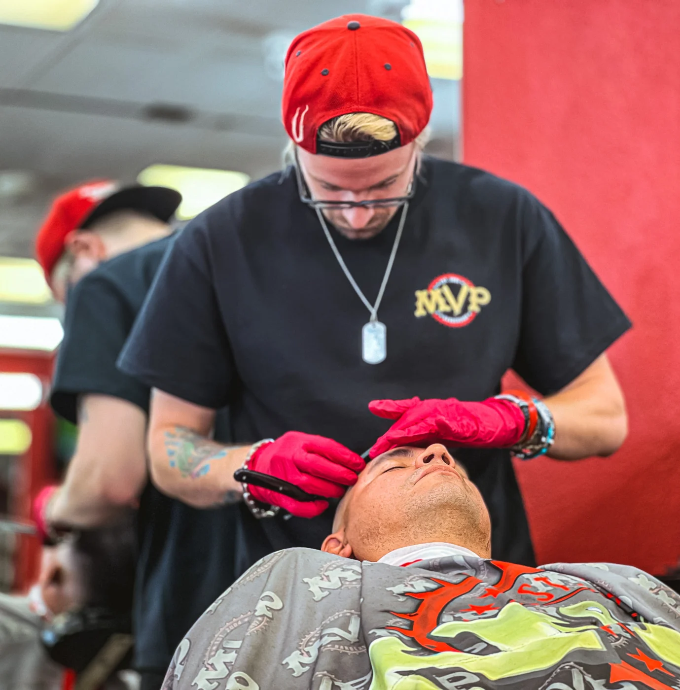 MVP barber providing a precision grooming service